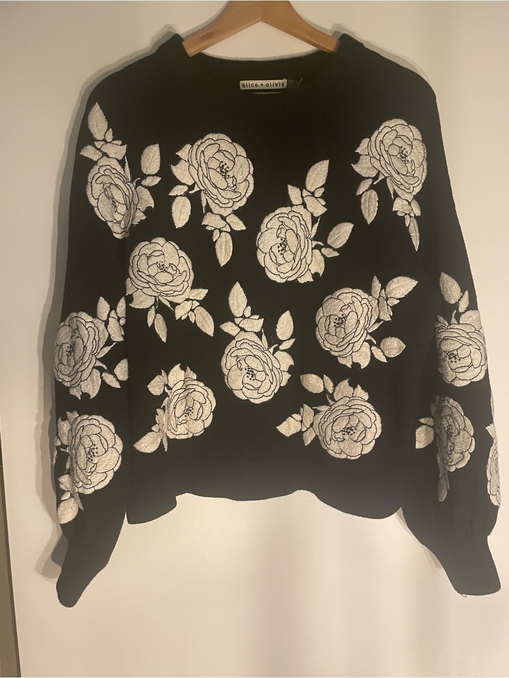 Alice + Olivia Black Sweater with White Rose Motif